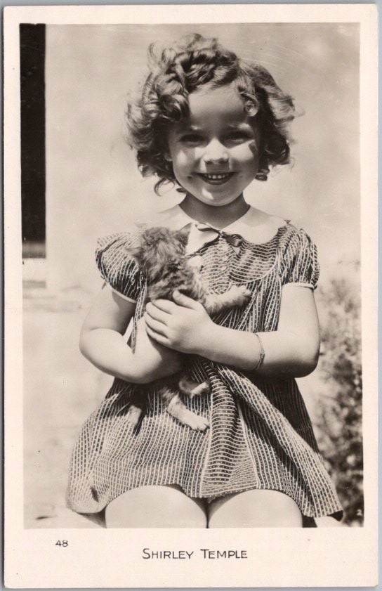 c1930s SHIRLEY TEMPLE Real Photo RPPC Postcard holding Kitten / European Card