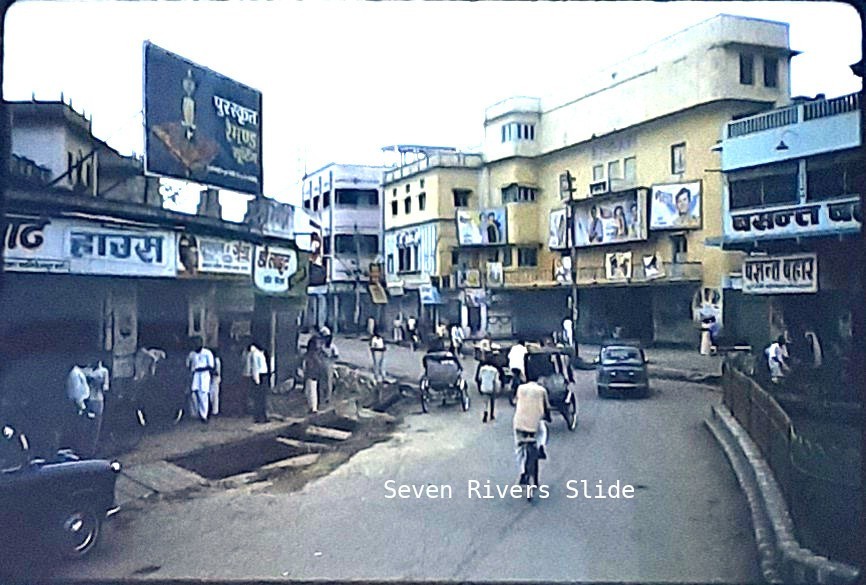 1971 Benares (Varanasi, India) Street Scene Signs People Cars 35mm Slide Photo 1971 Benares (Varanasi, India) Street Scene Signs People Cars 35mm Slide Photo