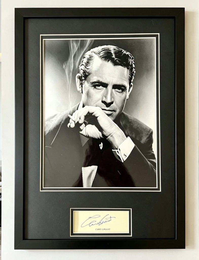 Cary Grant - 16 x 12 display Framed Photo with pre printed signature.