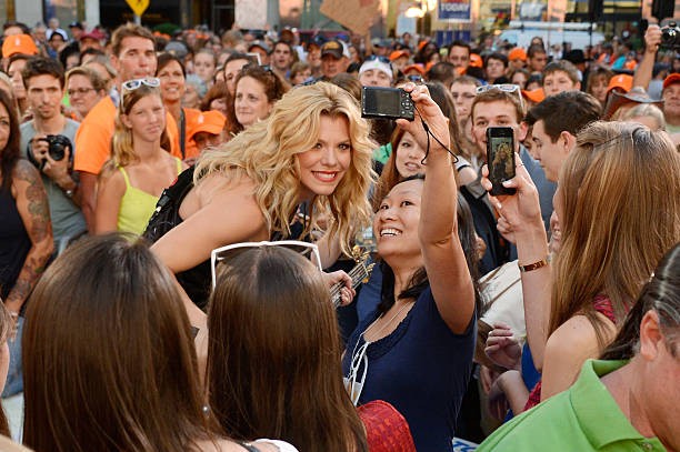 Singer Kimberly Perry of The Band Perry poses with fans on NBC\'s To- Old Photo 2