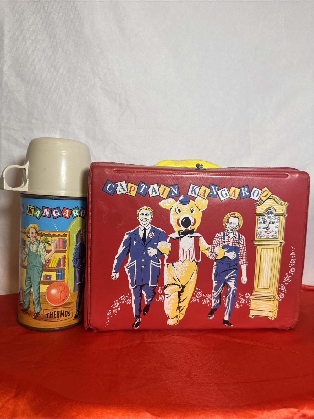 Vintage 1964 Captain Kangaroo red vinyl lunchbox and matching metal thermos set