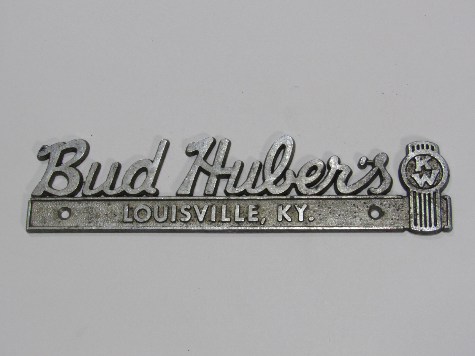 VTG Bud Huber's Kenworth Louisville Kentucky Metal Dealership Badge Emblem Tag VTG Bud Huber's Kenworth Louisville Kentucky Metal Dealership Badge Emblem Tag