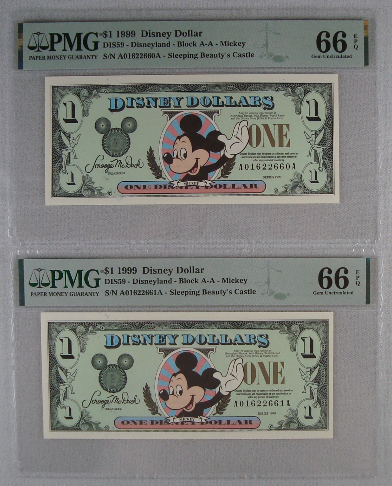 Lot of (2) Consecutive 1999 $1 Disney Dollar Mickey Mouse/Disneyland PMG 66 EPQ