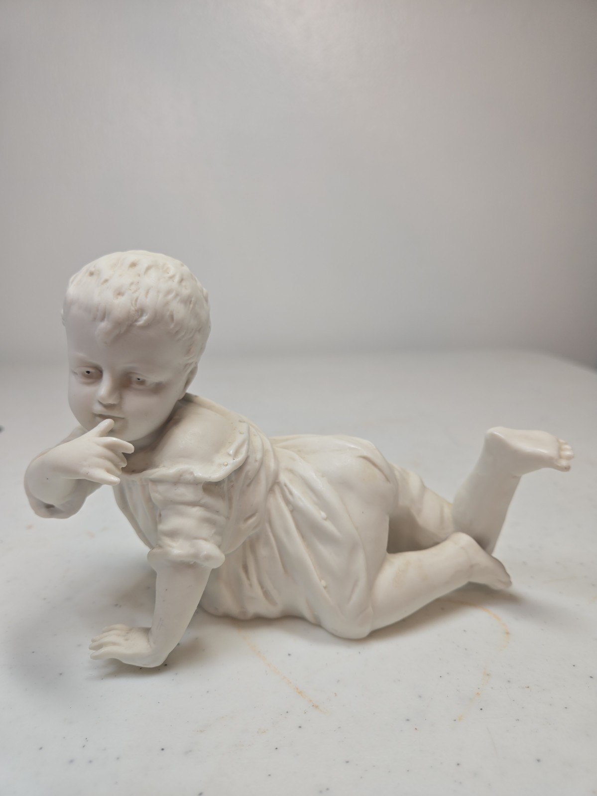 Antique German Carl Schneider Bisque Porcelain Piano Baby Figurine
