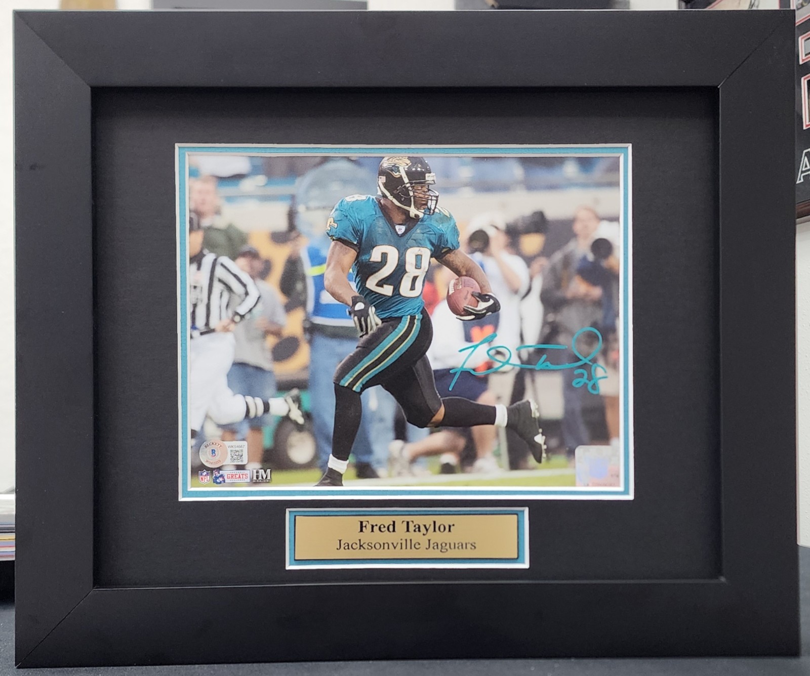 Fred Taylor Jacksonville Jaguars Signed and Framed 8x10 Beckett COA