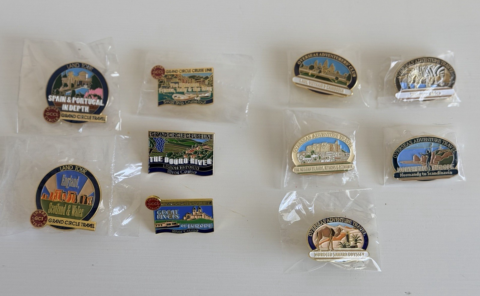 Overseas Adventures Travel, Grand Circle Travel Souvenir Pin Lot Of  9