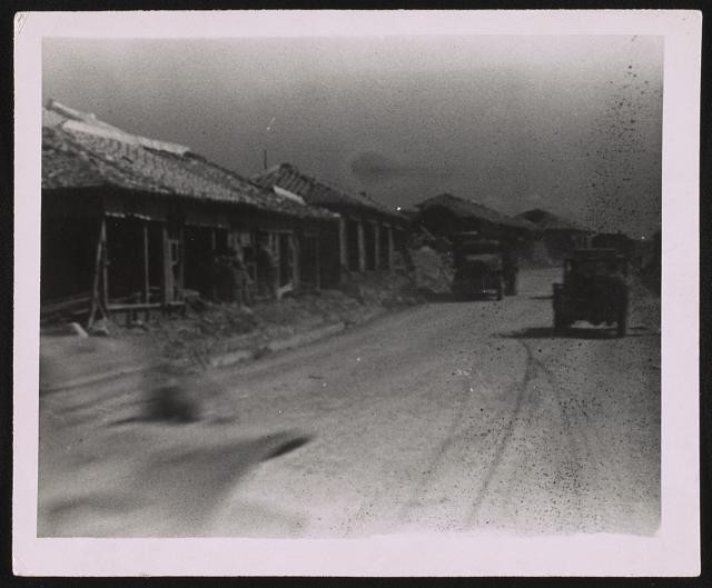 Photo:Village Road Trucks 1910s Dirt Street Houses
