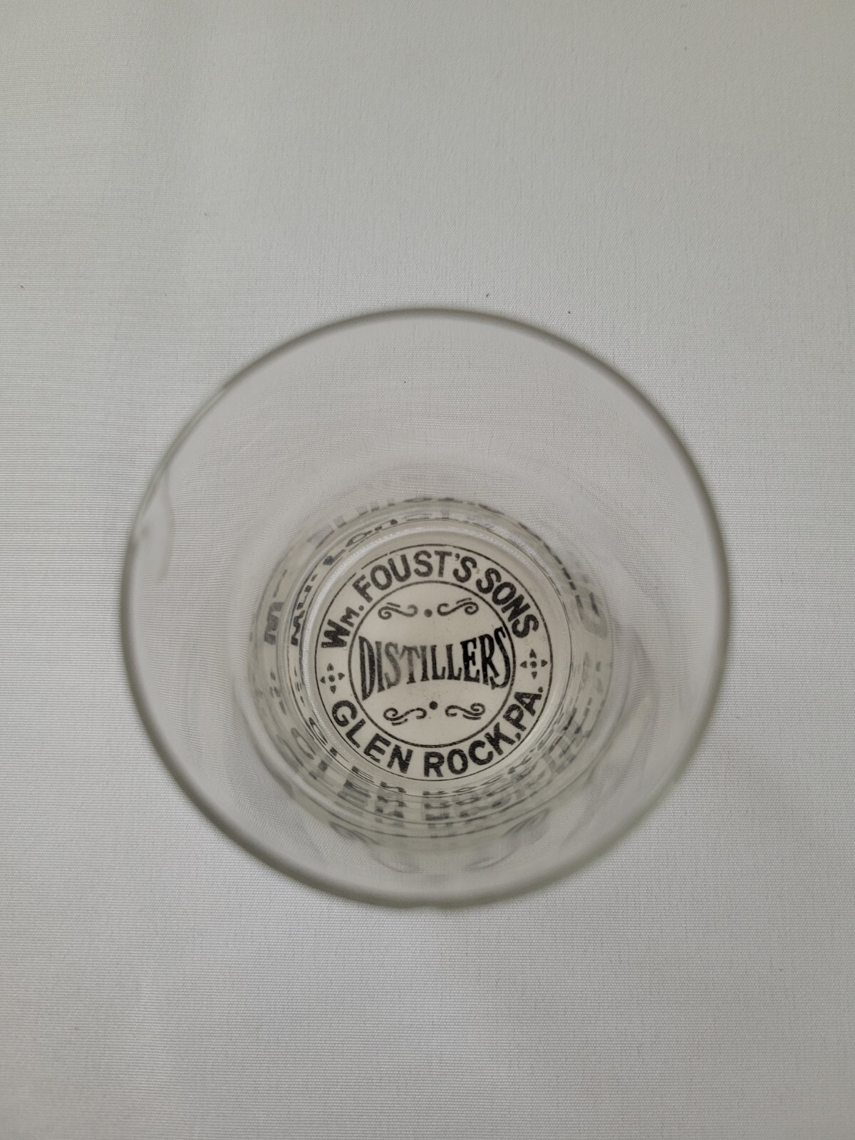 Wm Foust\'s Son Distillers Black Label Under Glass Shot Glass Glen Rock, PA Wm Foust\'s Son Distillers Black Label Under Glass Shot Glass Glen Rock, PA