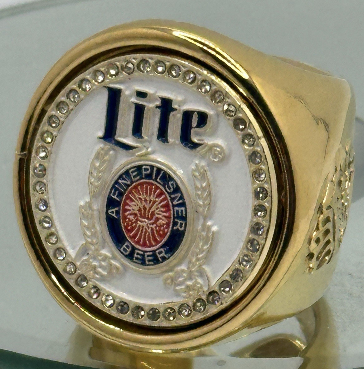 The Miller Lite deCAPitator Ring Bottle Cap & Can Tab Opener