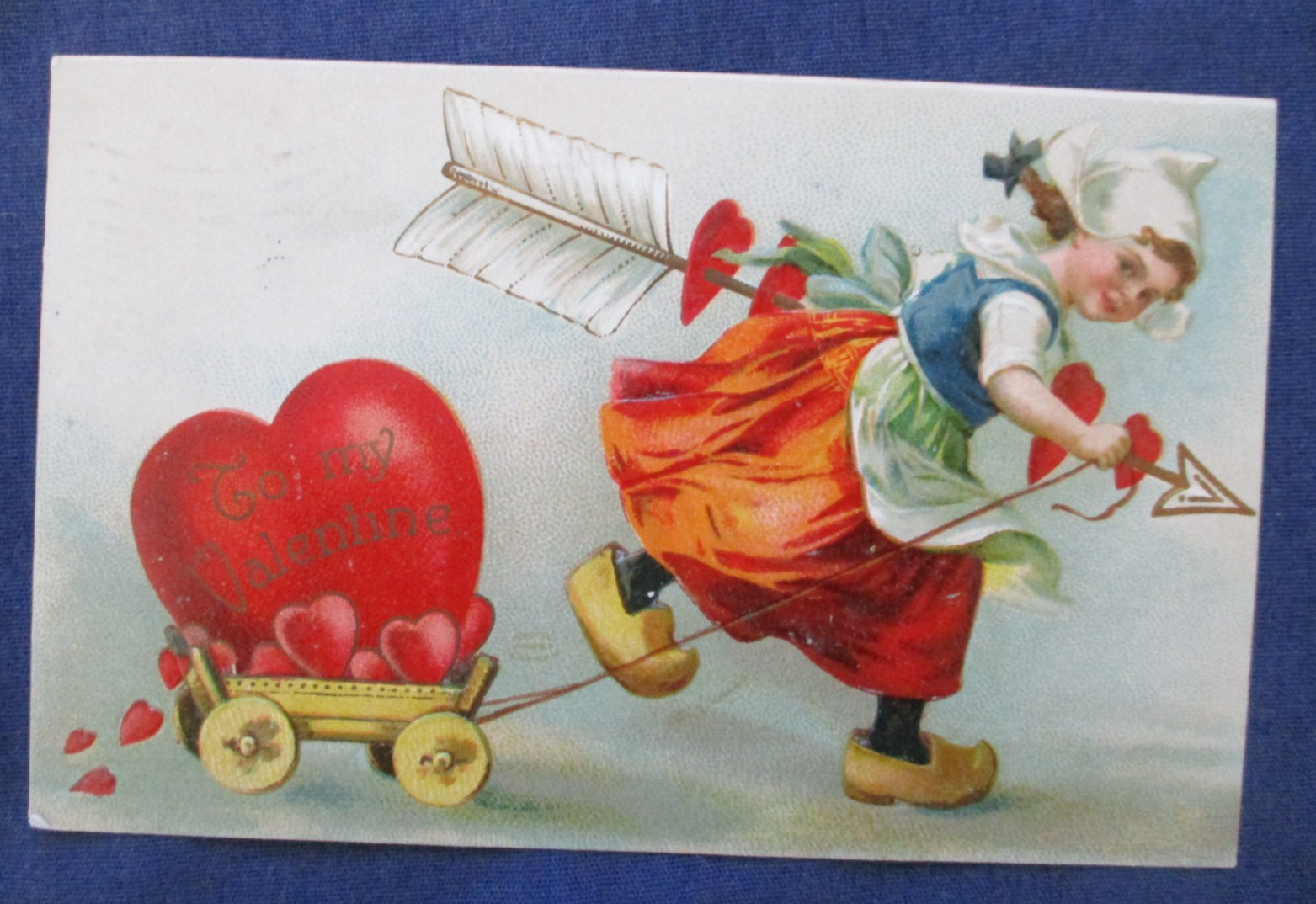 1909 Valentines Day Postcard Dutch Girl & Wagon Full of Hearts
