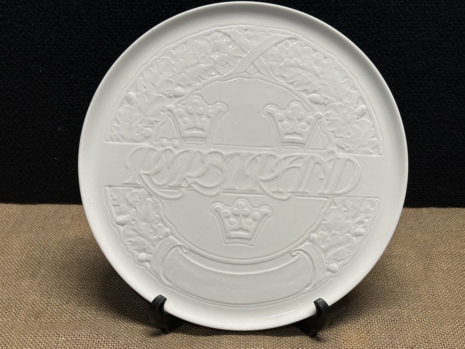 c1910s Rorstrand presentation plate, wall plaque, white, embossed with logo c1910s Rorstrand presentation plate, wall plaque, white, embossed with logo
