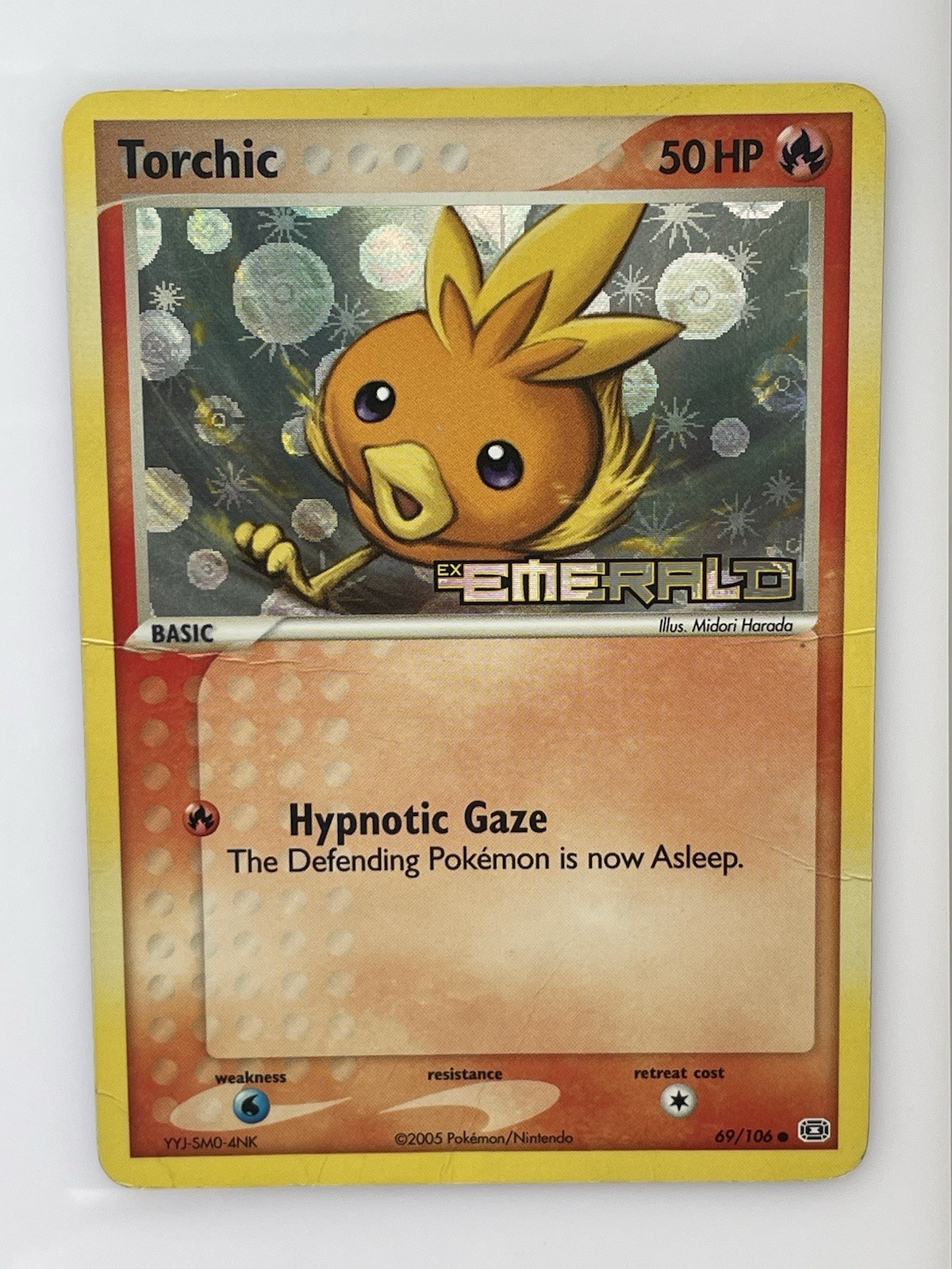Torchic 69/106 Ex Emerald Stamped Reverse Holo Heavily Played Nintendo 2005