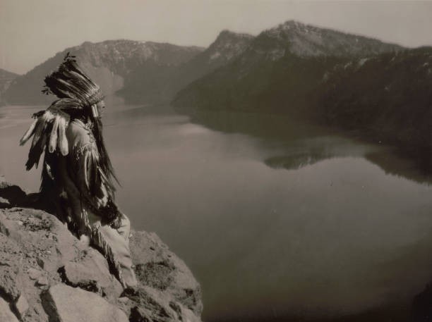 Crater Lake 1923 Photograph shows an American Indian man wearing a- Old Photo