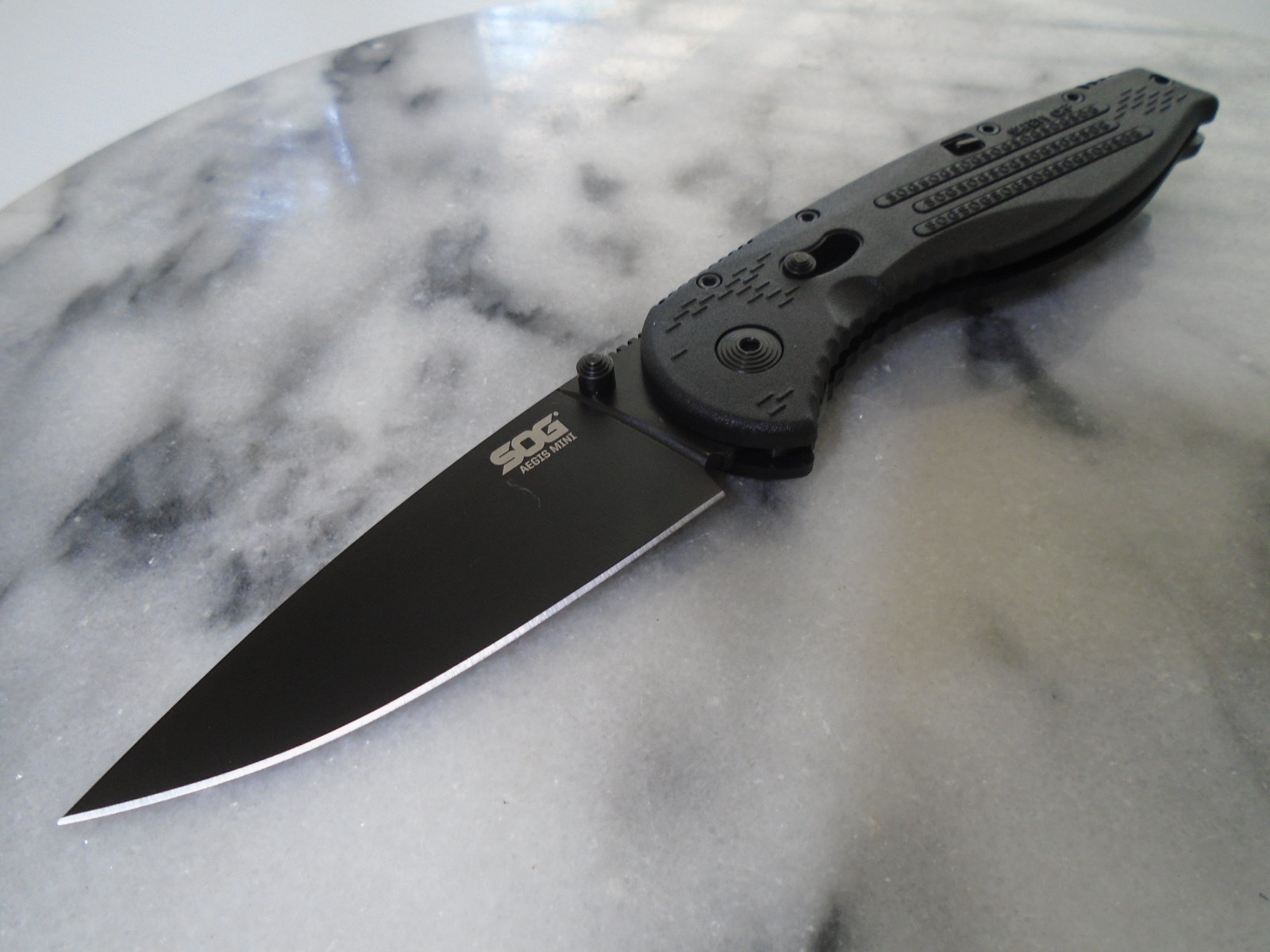 SOG Aegis Mini Assisted Open Pocket Knife Arc Lock Folder Aus-8 Rc 57-58 AE-22