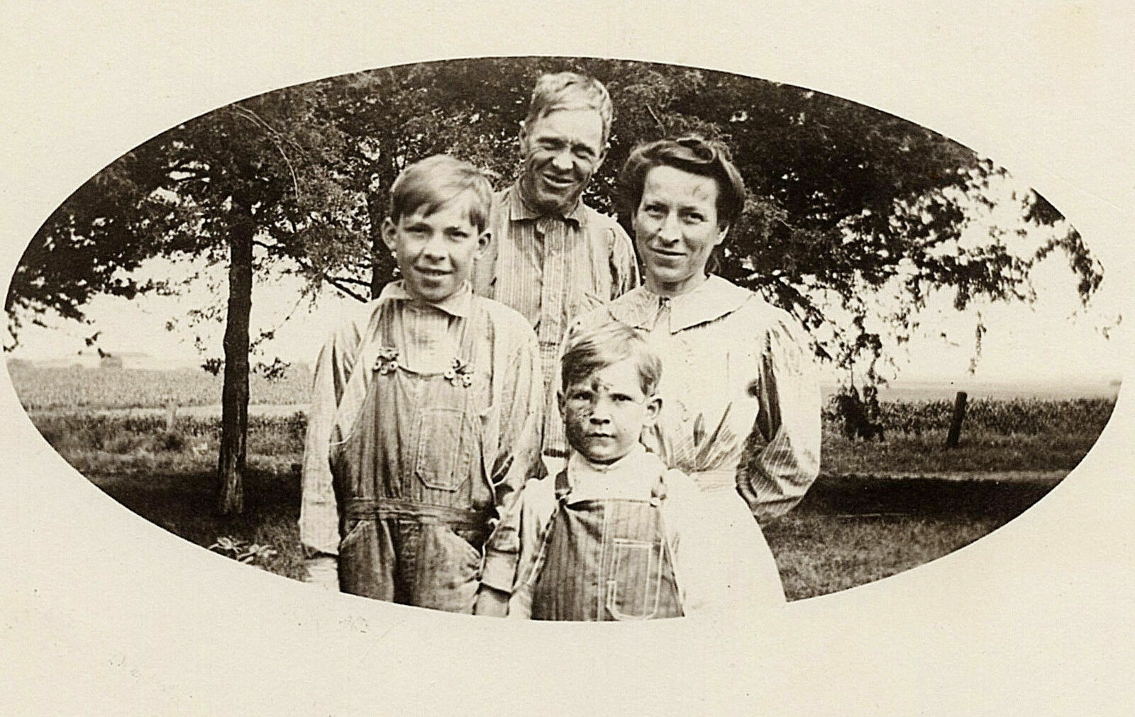 1907-18 RPPC Mr. & Mrs. William Hintz & Sons Family Portrait Real Photo Postcard