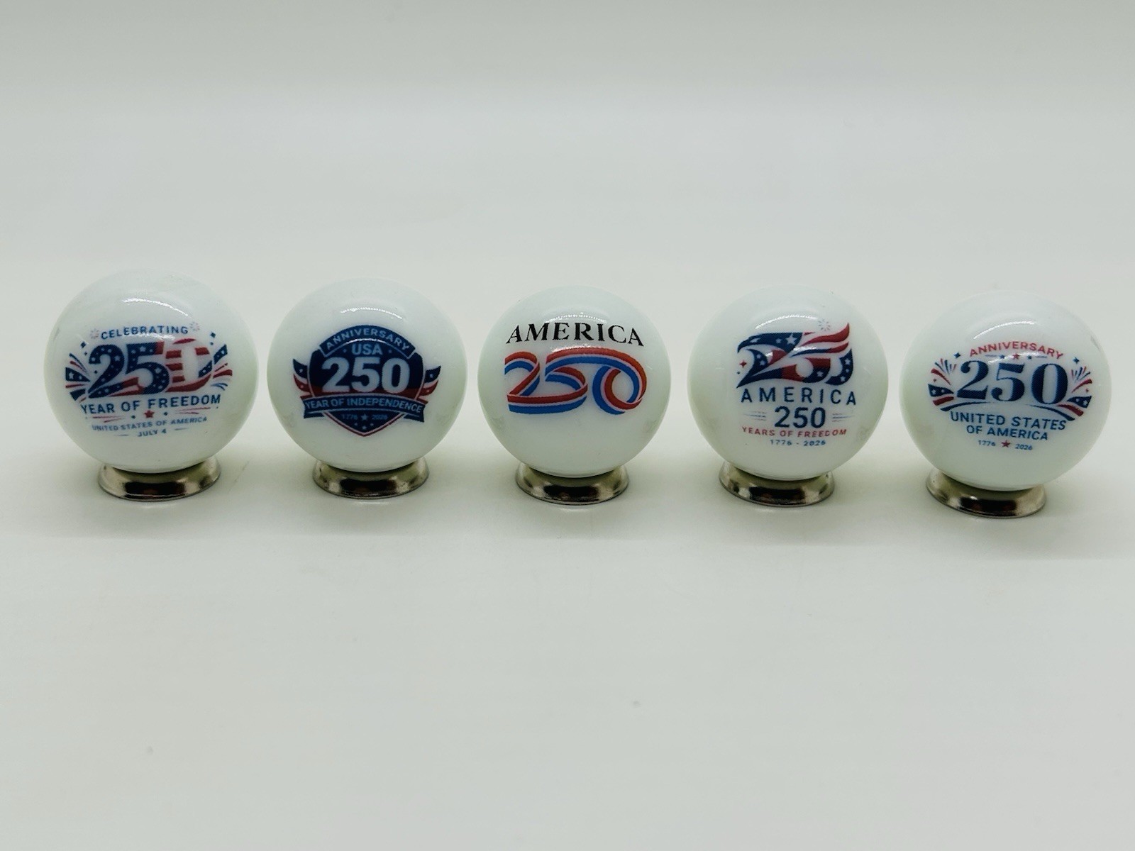 AMERICA 250 Collectible FIVE ONE INCH Glass Shooter Marbles & Stands.