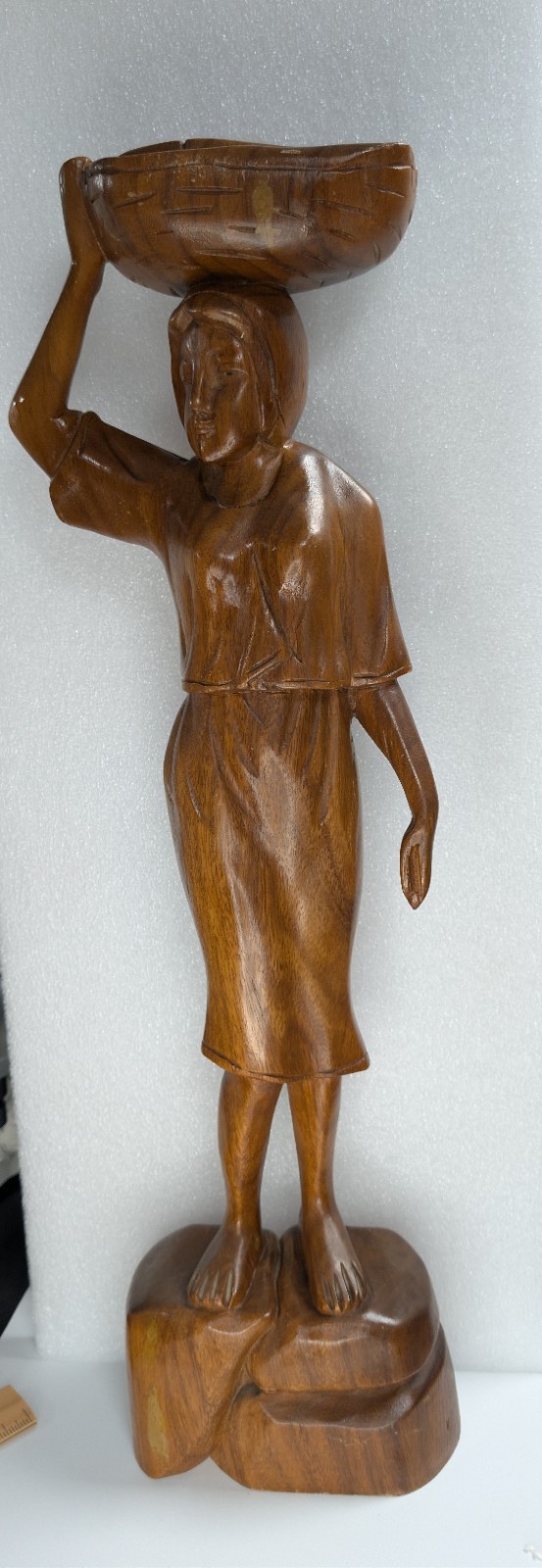 vintage handcarved wooden sculpture of a woman carrying a basket on her head 23 vintage handcarved wooden sculpture of a woman carrying a basket on her head 23