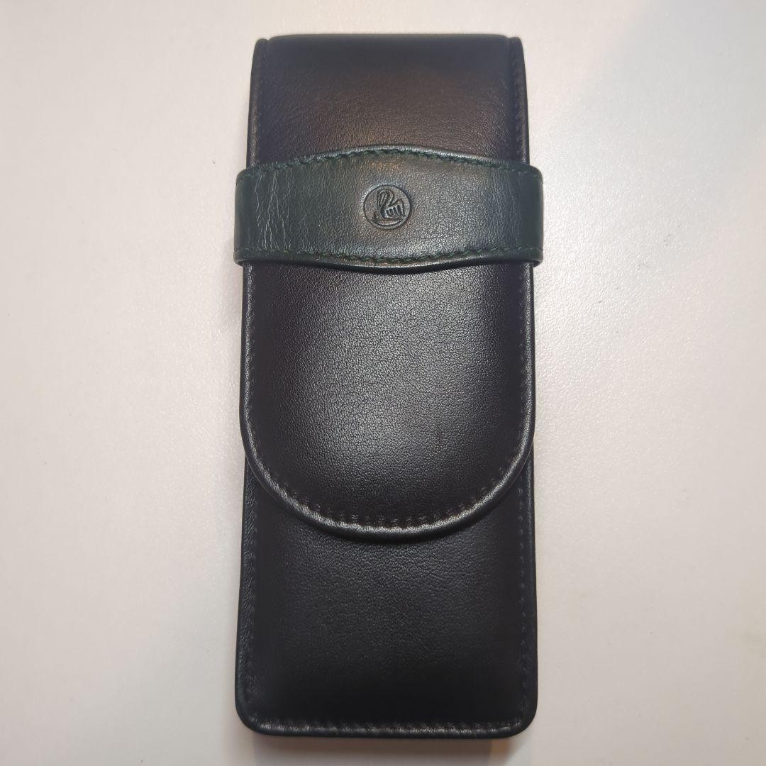 Mint PELICAN Leather Black Green w/ Case