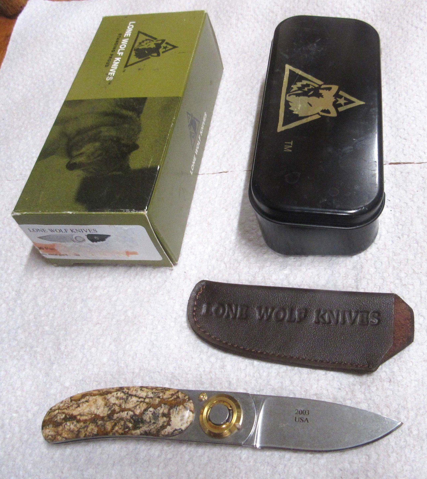 Paul Lone Wolf Pocket Knife with Stone Handels 2003 ,With Tin and pouch Paul Lone Wolf Pocket Knife with Stone Handels 2003 ,With Tin and pouch