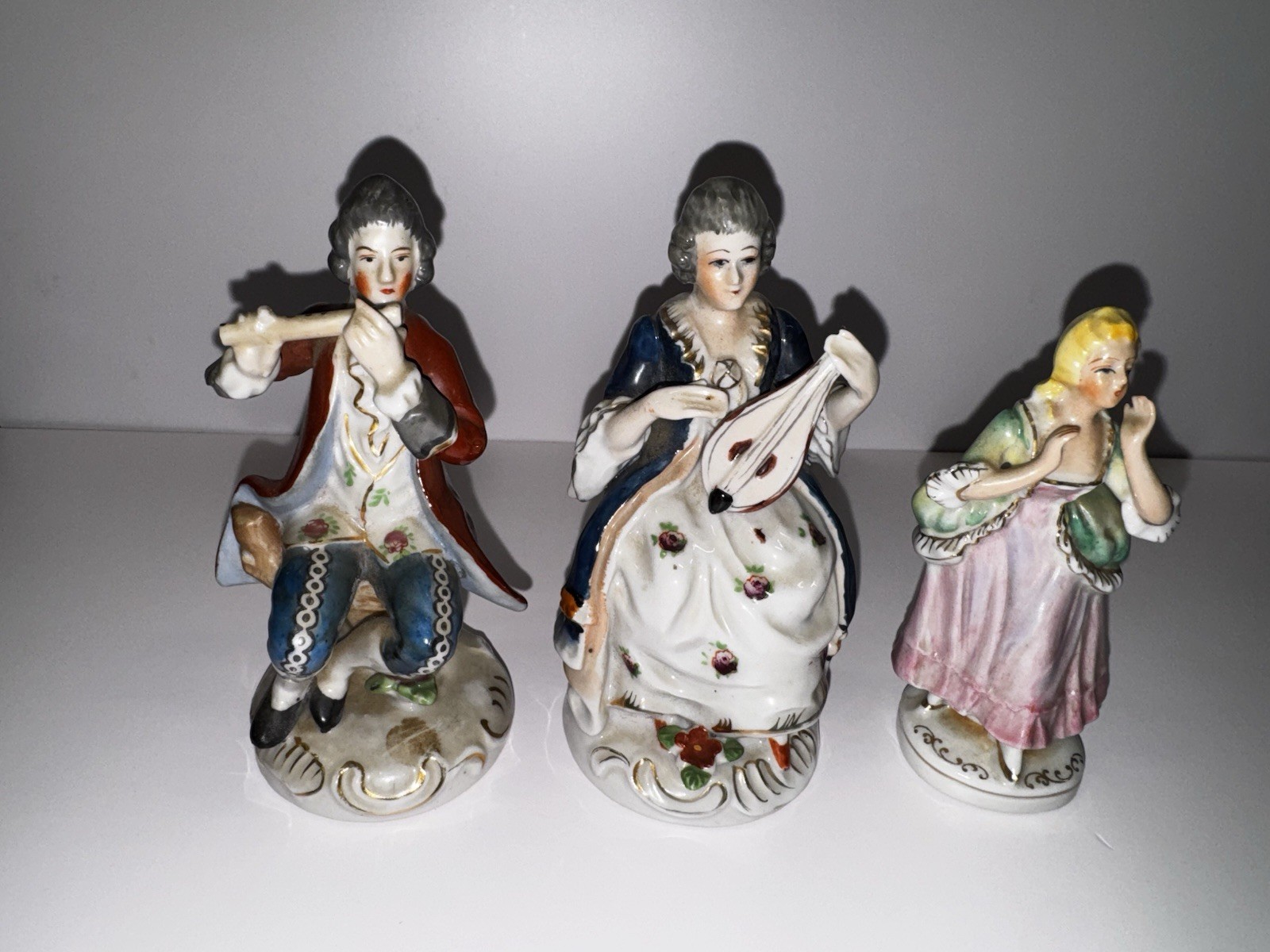 Occupied Japan Porcelain Figurines – Hand-Painted Vintage Collectibles, set of 3 Occupied Japan Porcelain Figurines – Hand-Painted Vintage Collectibles, set of 3