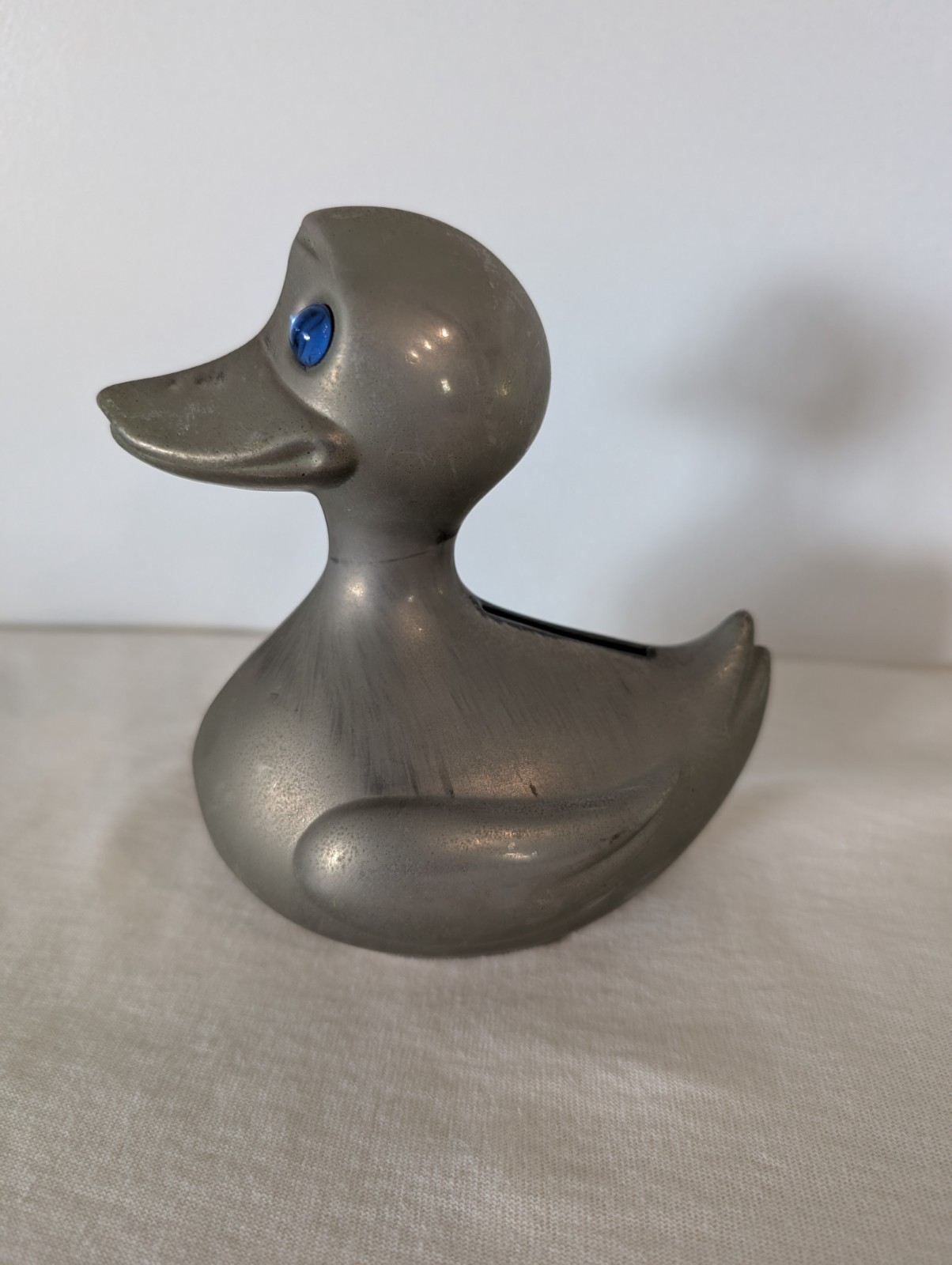 Vintage Silver-Plated Duck Bank Collectible With Blue Jewel Eyes & Bottom Plate
