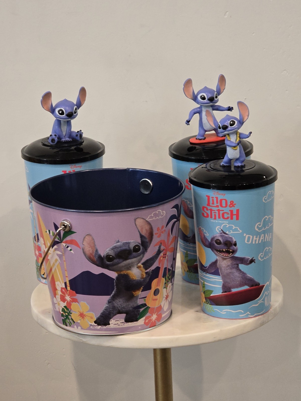 Lilo & Stitch 2025 AMC Exclusive Cups & Stitch Toppers Lid & Tin Bucket 4 Pc Set Lilo & Stitch 2025 AMC Exclusive Cups & Stitch Toppers Lid & Tin Bucket 4 Pc Set