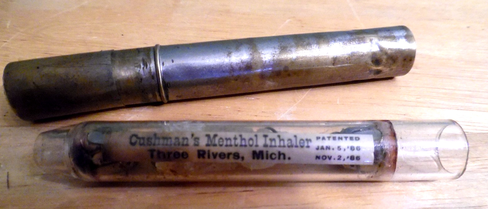 ANTQ 1886 ORIG CUSHMANS GLASS MENTHOL INHALER IN ORIG TIN TUBE