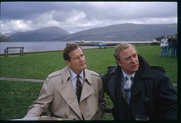 British actors Roger Moore and Michael Caine brave typically gray - Old Photo