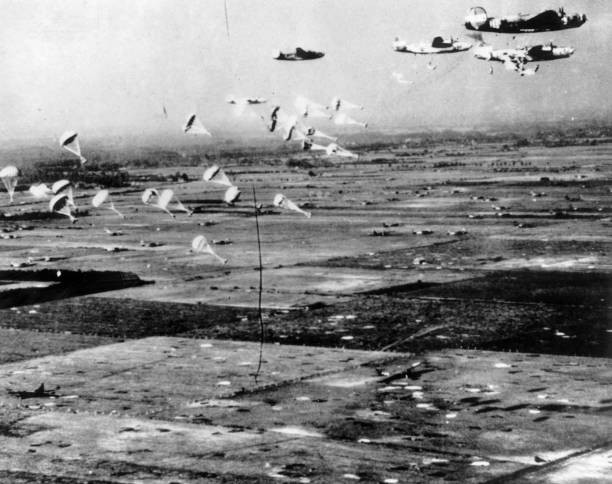 Flight of B 24 Liberators from Eighth Air Force swoops low over Du- Old Photo