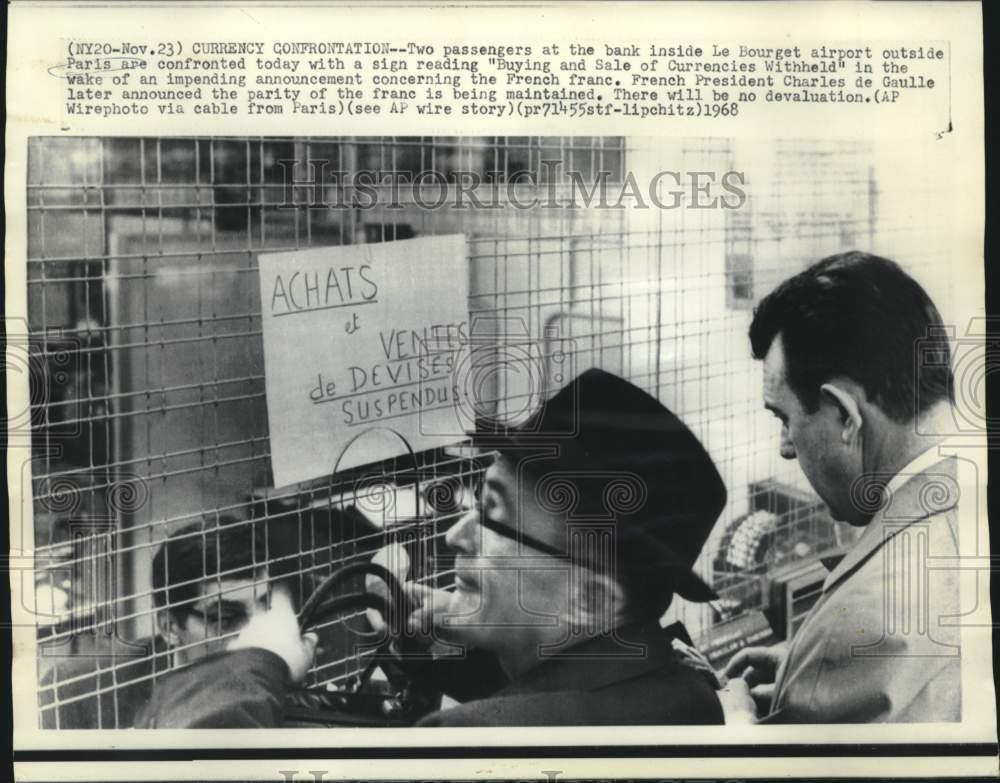 1968 Press Photo Passengers at Le Bourget Airport bank reads sign - now29994