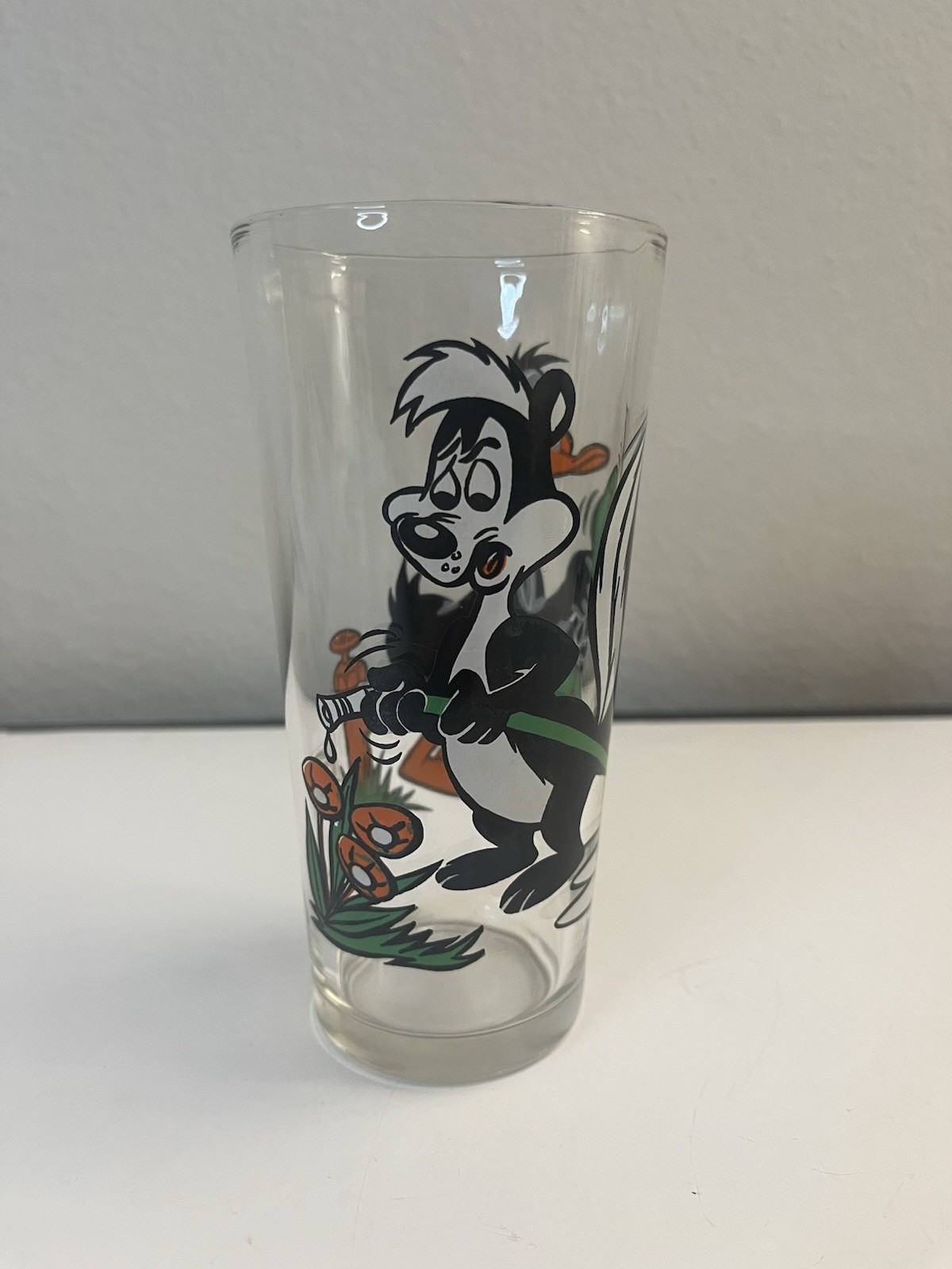 Vintage “Pepe Le Pew” And “Daffy Duck” 1973 Pepsi Collector Series Glass Vintage “Pepe Le Pew” And “Daffy Duck” 1973 Pepsi Collector Series Glass