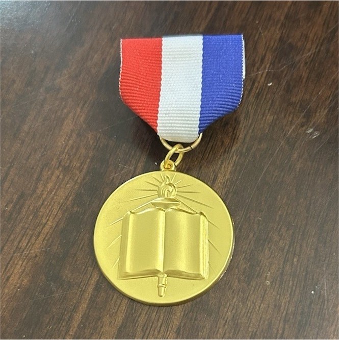 Gold Academic Achievement Medal with Red White Blue Ribbon, case