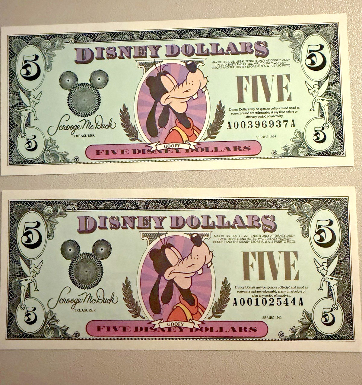 One 1993 & One 1998 $5 Disney Dollar Goofy Series AA Uncirculated-Used Envelope