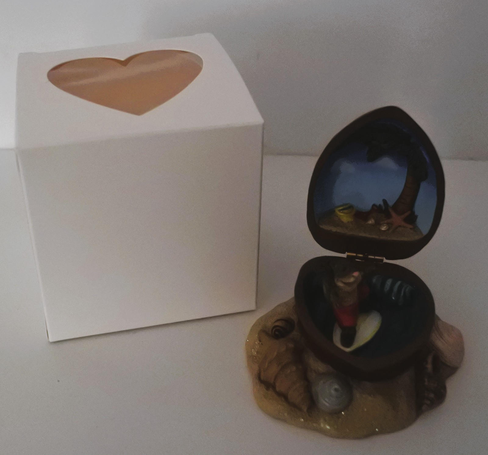 Maruri In a Nut Shell SURFING THE INNERNUT figurine  by Jill Trenholm  RARE