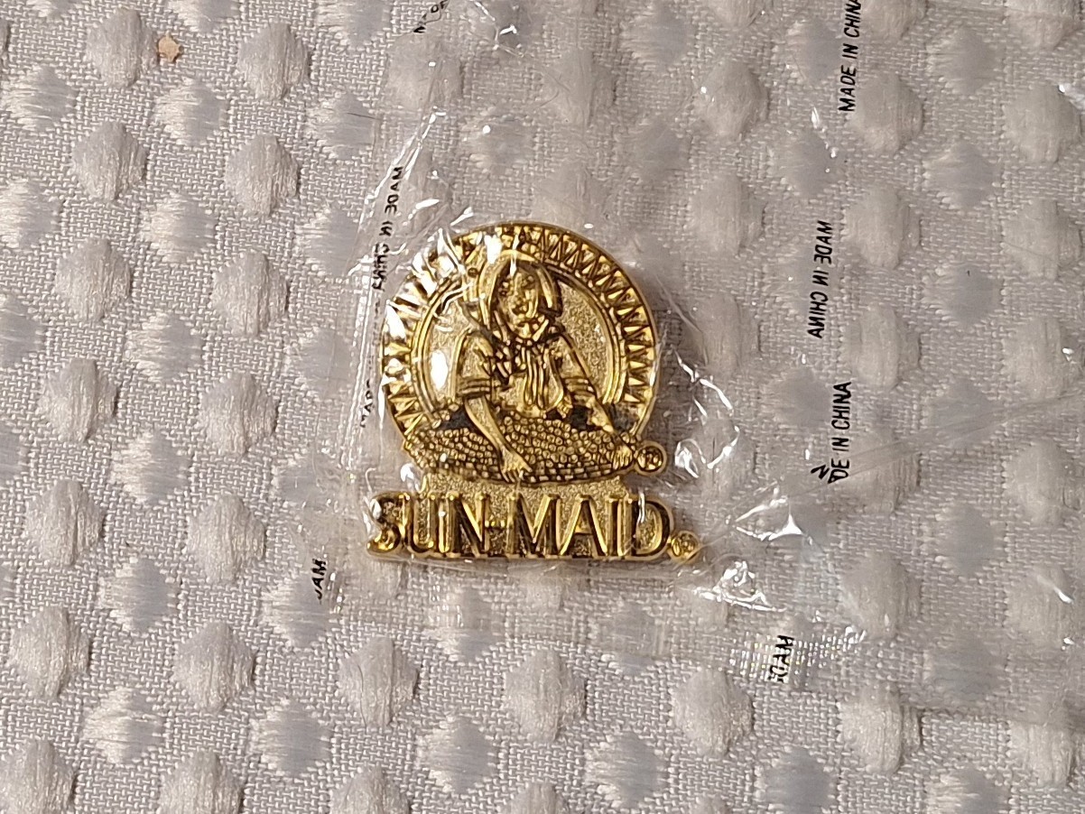 Vintage Sun Maid Raisins Harvest Girl Logo Gold Tone Metal Pin Promo Advertising