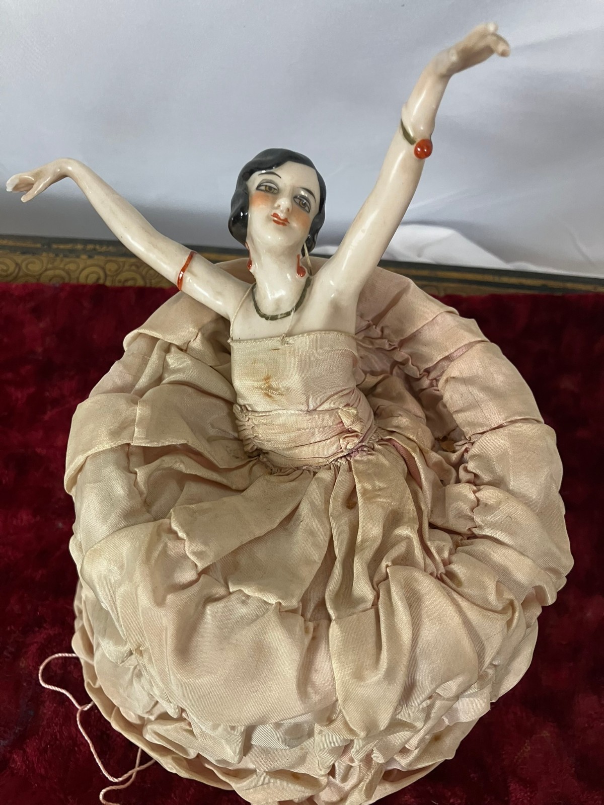Vintage French Art Deco Arms-away flapper half-doll on a silk-skirted box base