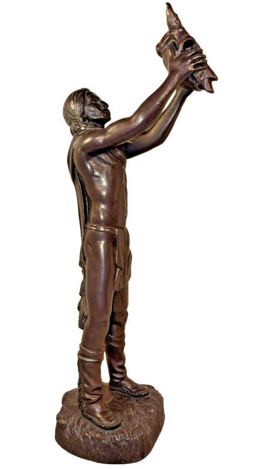 American Native American Figure Holding Raised Animal Skull by Austin Production