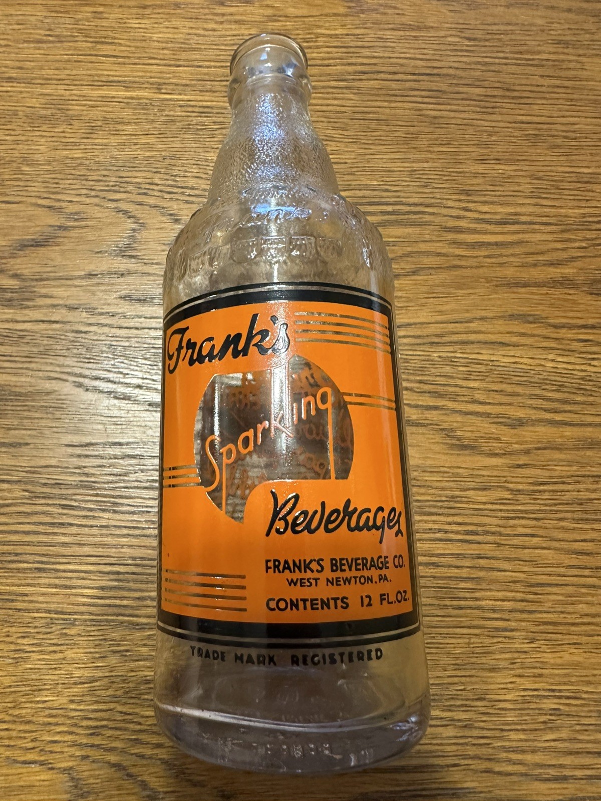 WEST NEWTON,PA FRANK'S BEVERAGES SCARCE EARLY ORANGE & BLACK ACL SODA BOTTLE WEST NEWTON,PA FRANK'S BEVERAGES SCARCE EARLY ORANGE & BLACK ACL SODA BOTTLE