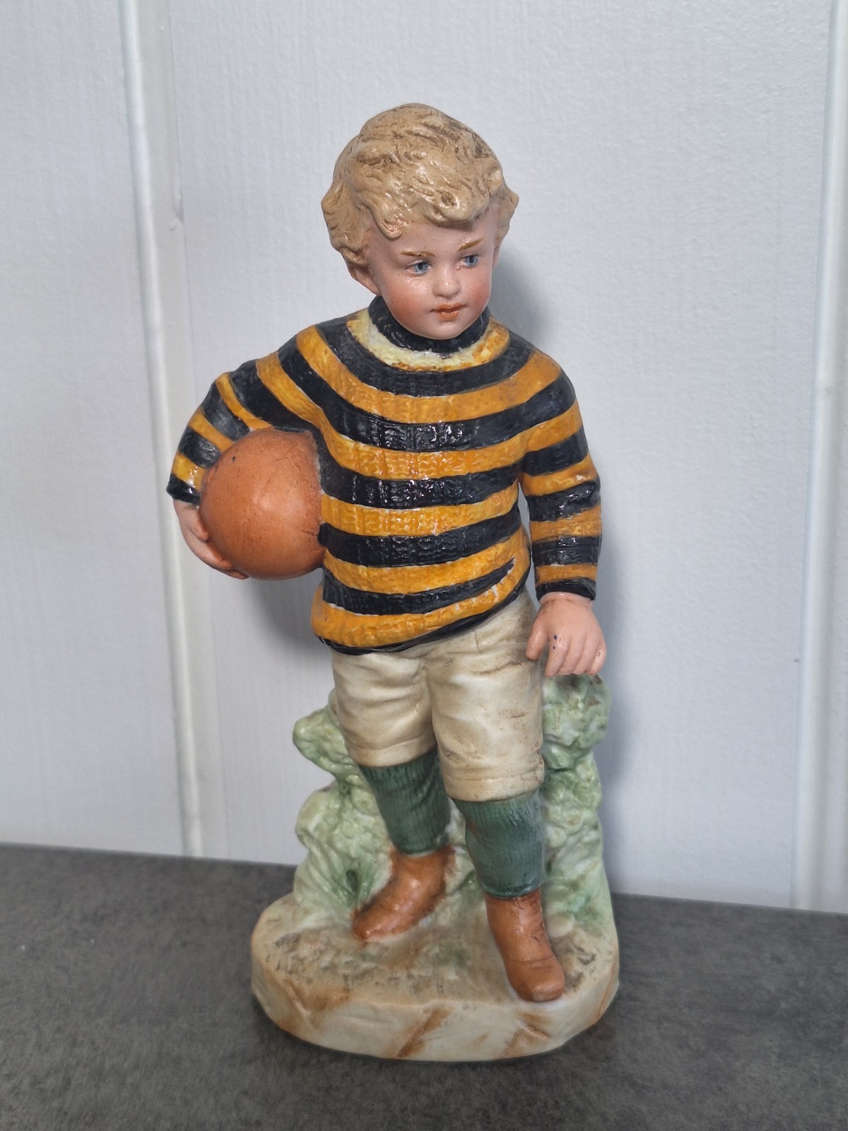 German Bisque Porcelain Figurine of A Boy Gebruder Heubach Germany C. 1900 German Bisque Porcelain Figurine of A Boy Gebruder Heubach Germany C. 1900