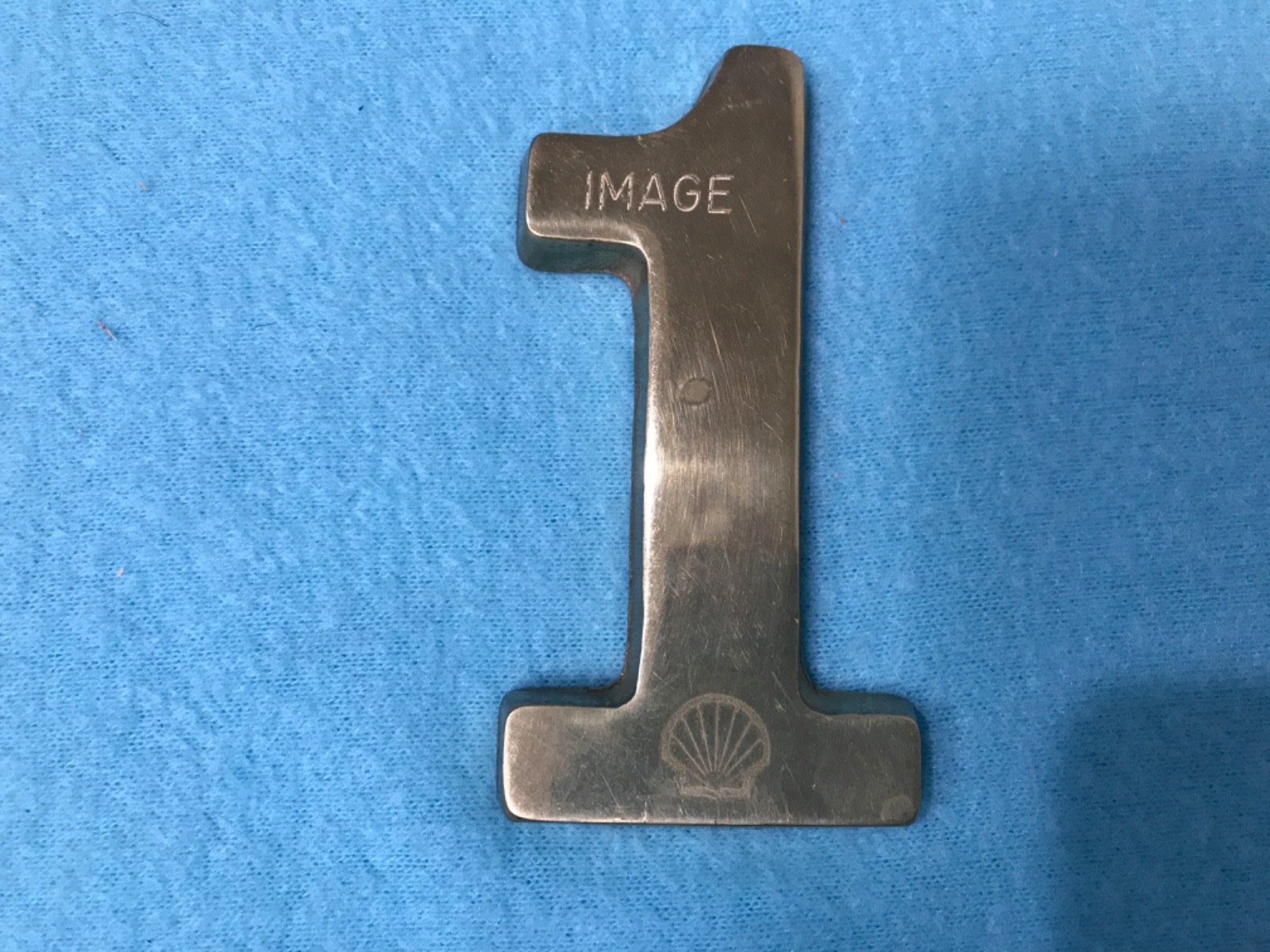 Shell Number 1 Brass Paperweight