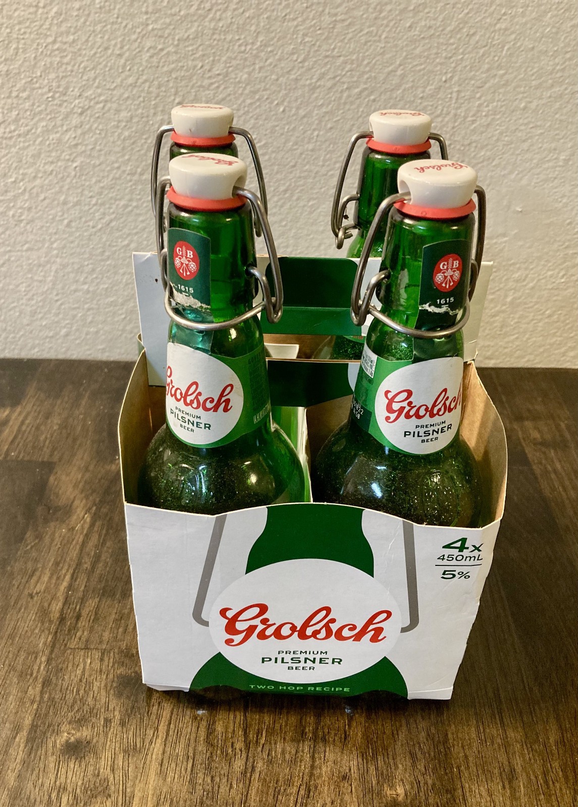 Grolsch Green Flip-Top Beer Bottles - Set Of 4  with Carrier. 10 sets available.