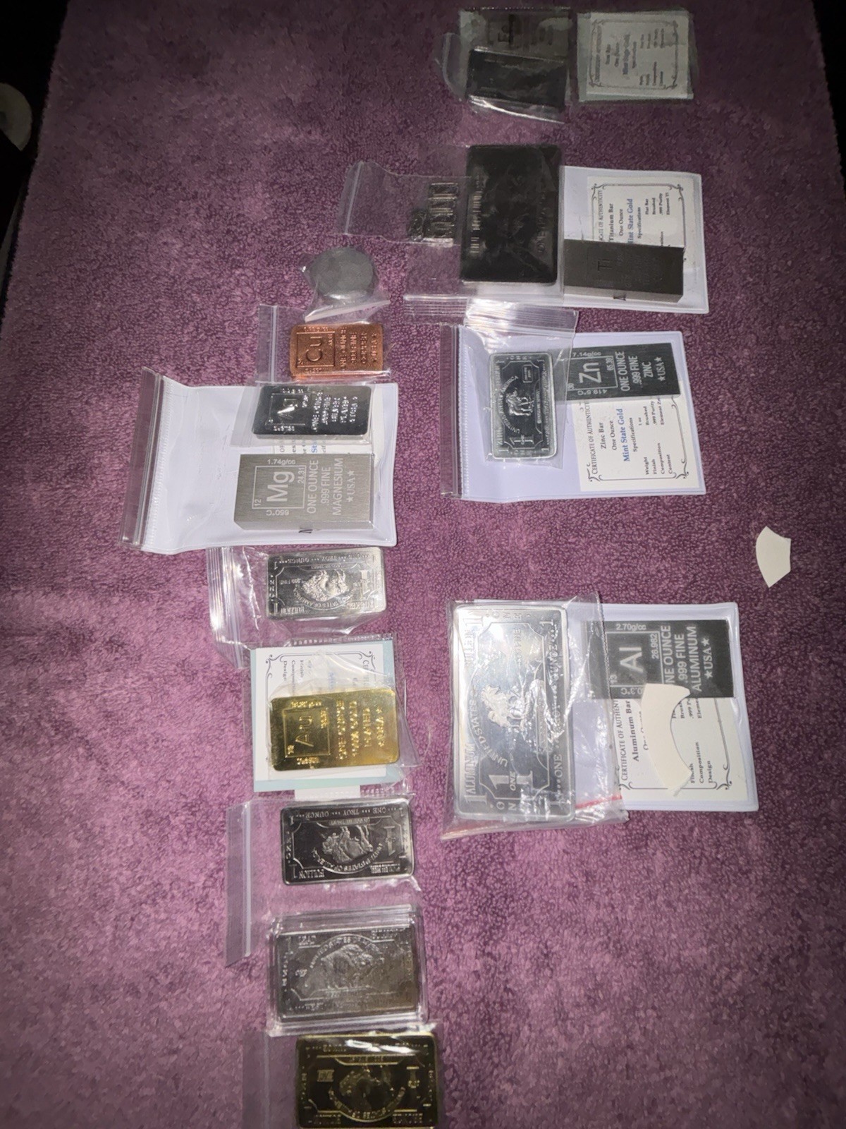 Non Precious Metal collection 17 ounce bars and 5 half gram. Sold as a set Non Precious Metal collection 17 ounce bars and 5 half gram. Sold as a set