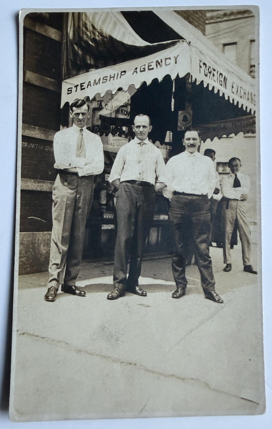 c1910s RPPC Postcard Steamship Agency Cigar Tobacco Storefront Occupational