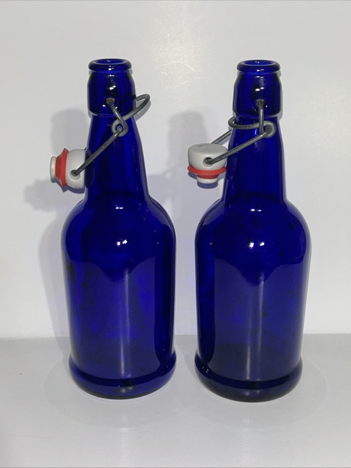 2 COBALT BLUE WIRE PORCELAIN CAP MARKED BOTTLE 9.5\