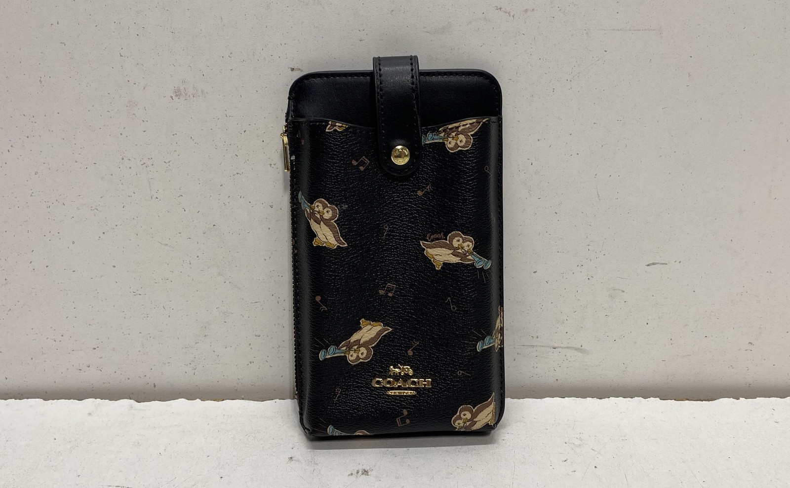 Coach Black Penguin Print North South Zip Phone Crossbody Bag Gold Hardware