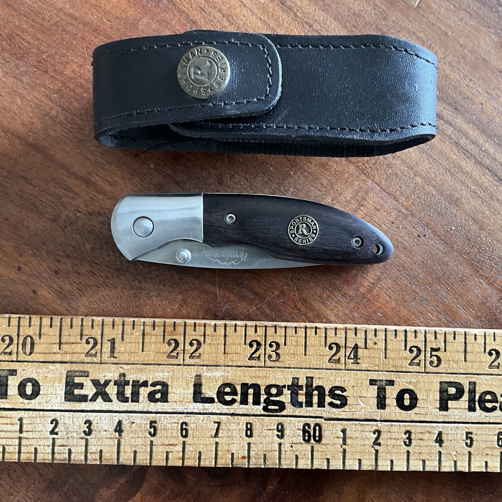 Remington Sportsman Series Folding Knife With Leather Sheath