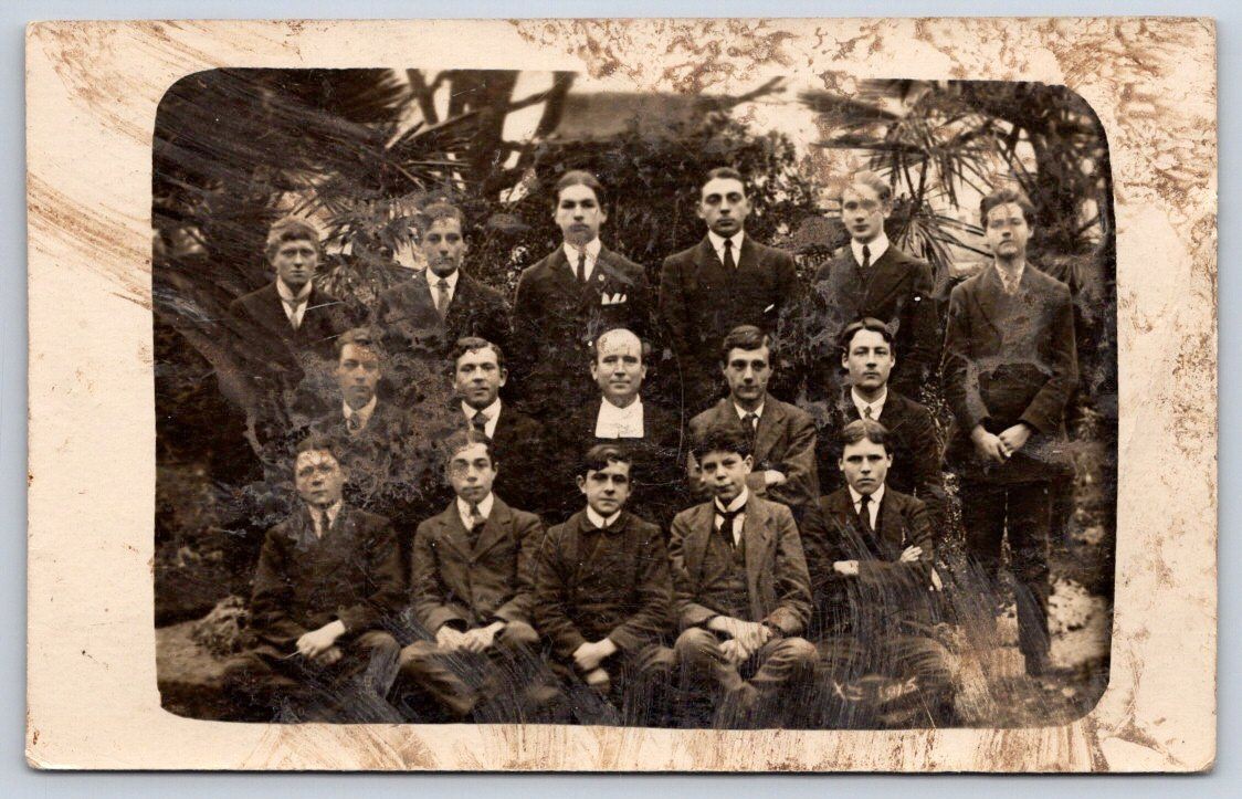 Guernsey Antique group of young men formal portrait outdoors 1916 RPPC