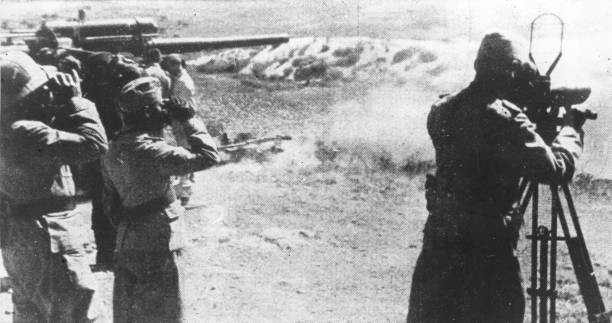 Italian soldiers scan horizon through binoculars while their colle- Old Photo