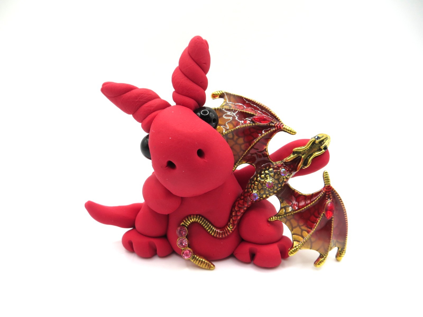 Red dragon with a gold and red flying dragon