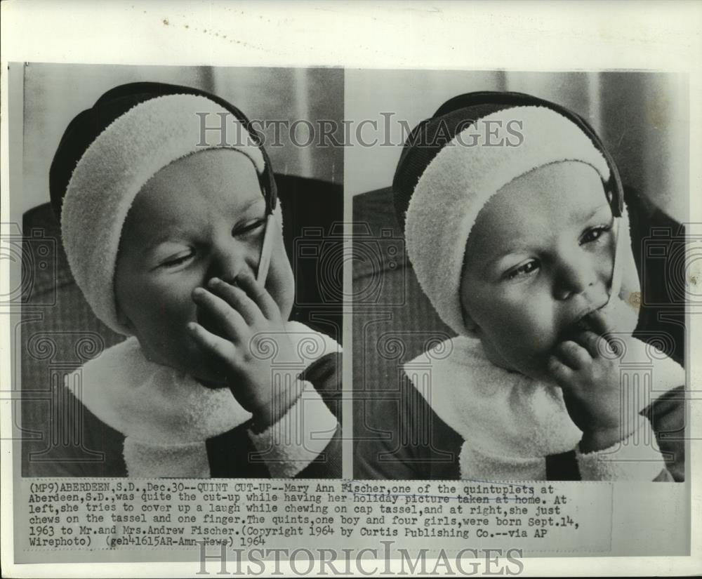 1964 Press Photo Mary Ann, one of the Fischer quintuplets chews on cap tassel 1964 Press Photo Mary Ann, one of the Fischer quintuplets chews on cap tassel